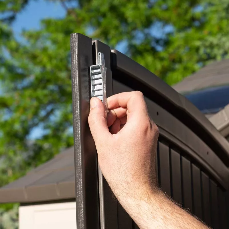 Plastic storage shed 10 ft wide X 8 ft deep; A clearance sale